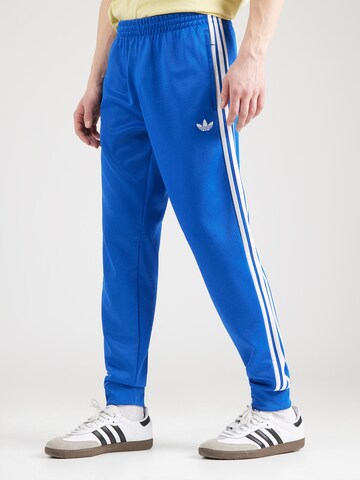 Effilé Pantalon ADIDAS ORIGINALS en bleu : devant