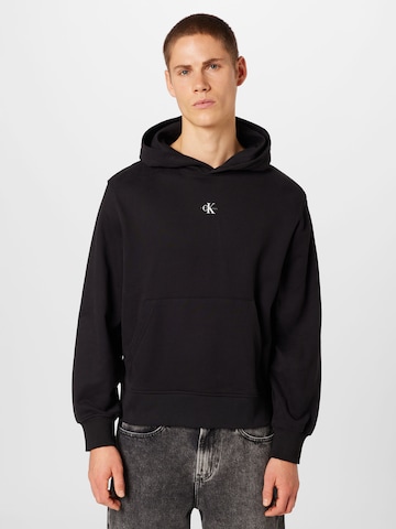 Calvin Klein Jeans - Sweatshirt em preto: frente