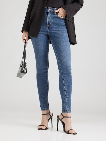 Skinny Jeans de la DKNY pe albastru: față