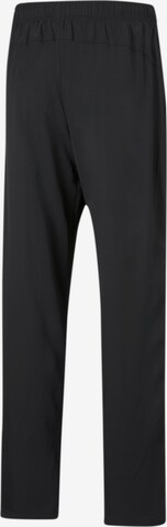 PUMA Tapered Sportbroek in Zwart