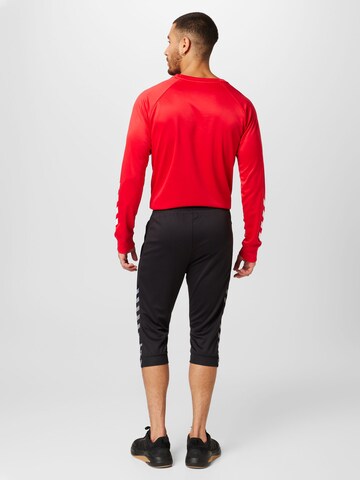 Coupe slim Pantalon de sport Hummel en noir