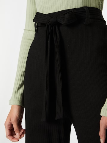 ABOUT YOU Wide leg Pants 'Mona' in Black