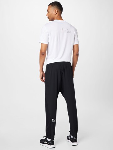 Regular Pantaloni sport de la Lacoste Sport pe negru