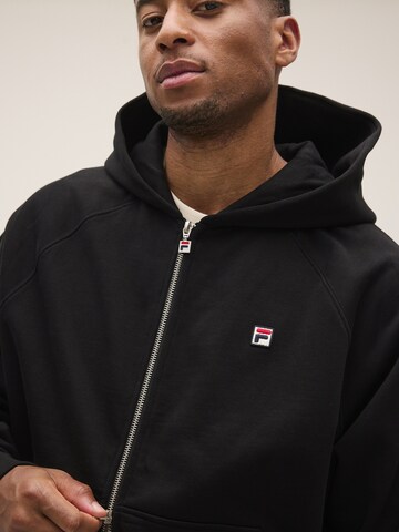 FILA - Sudadera con cremallera 'BORNO oversized raglan 2-way zip hoodie' en negro