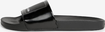 Calvin Klein Mules in Black: front