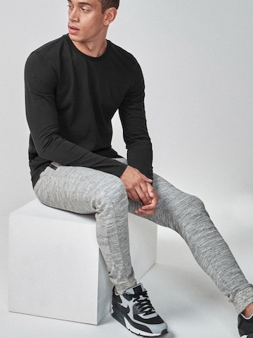 T-Shirt Next en noir