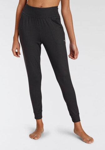 Effilé Pantalon de sport PUMA en noir : devant