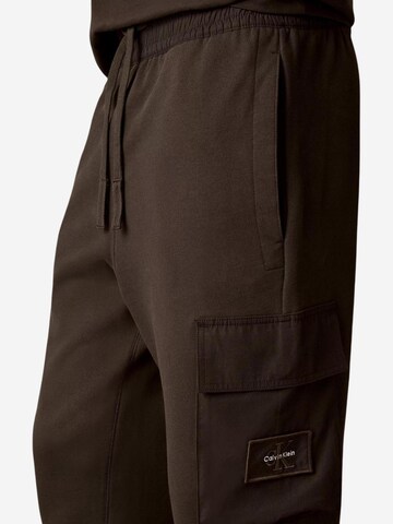 Calvin Klein Jeans Wide leg Sportbroek 'LV04RJ204G' in Bruin