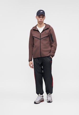 Nike Sportswear - Sudadera con cremallera 'Tech Fleece' en marrón: frente