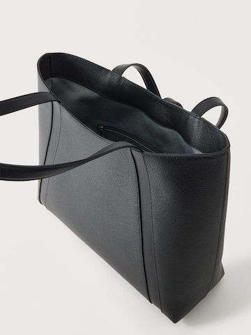 FURLA Ostoskassi 'GOCCIA' värissä musta