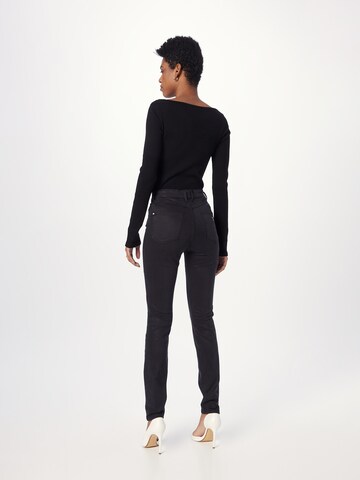 GUESS Skinny Jeans in Zwart