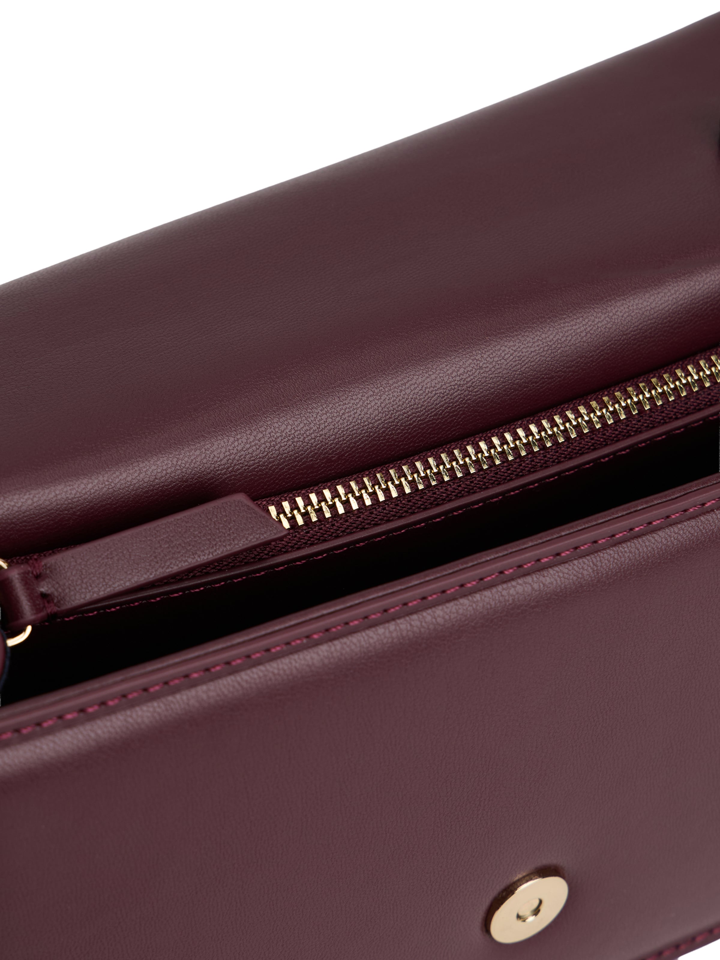 TOMMY HILFIGER Olkalaukku 'HERITAGE' värissä punainen