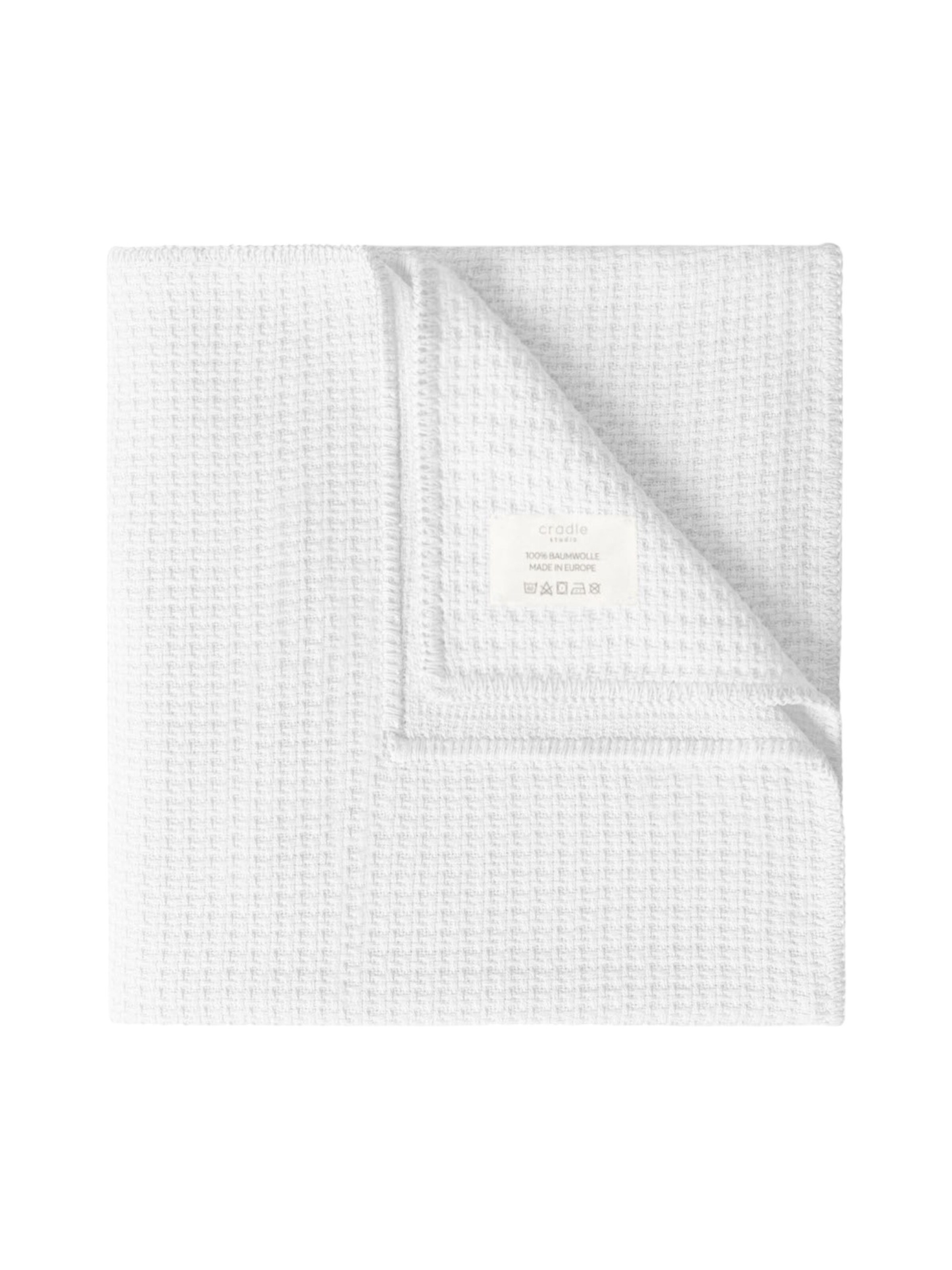 Cradle Studio Blankets in White: front
