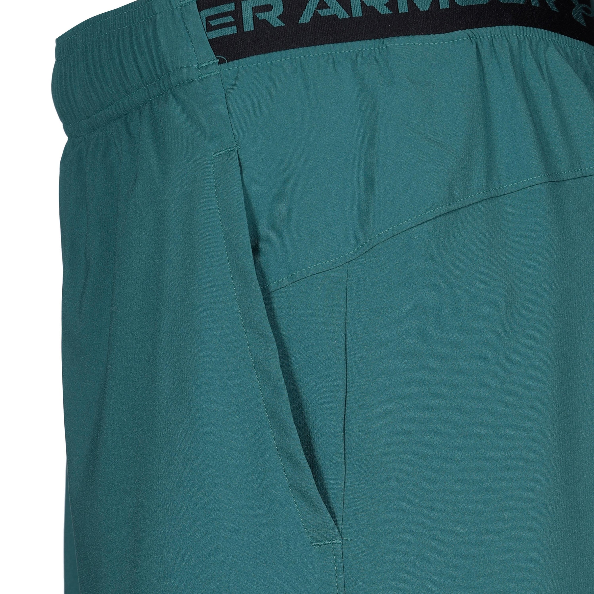 UNDER ARMOUR Regular Sports trousers in Green