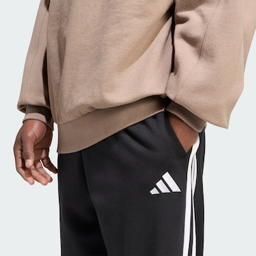 ADIDAS SPORTSWEAR Tapered Sportbroek 'Essentials' in Zwart
