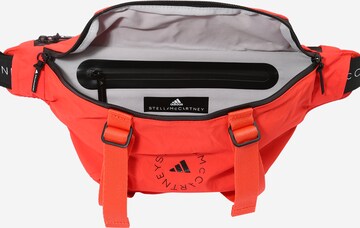 ADIDAS BY STELLA MCCARTNEY Sports belt bag in Orange
