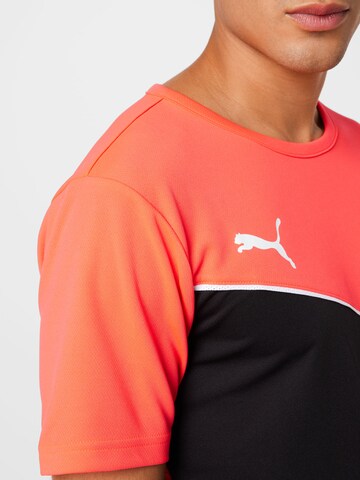 PUMA Sportshirt 'Individual Rise' in Orange