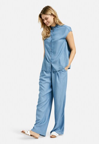 Milano Italy Ärmellose Bluse mit Rüschenkragen in Blau