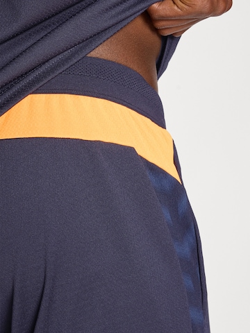 PUMA Regular Sports trousers 'Individual CUP' in Blue