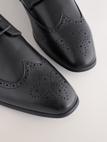 Next Čevlji na vezalke | črna barva