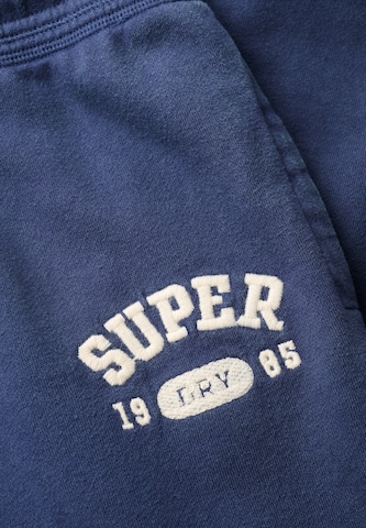 Bootcut Pantalon 'Athletic Essentials' Superdry en bleu