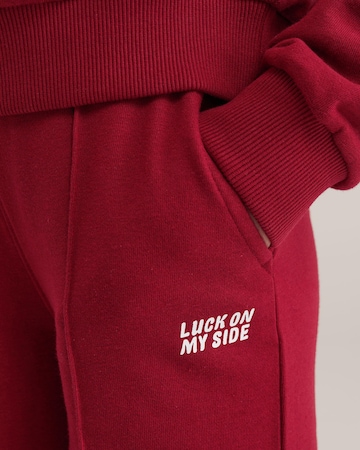 WE Fashion Wide leg Trousers in Red
