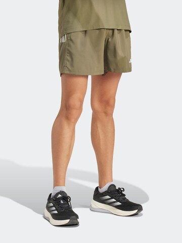 ADIDAS PERFORMANCE Regular Sports trousers 'Own The Run' in Green: front