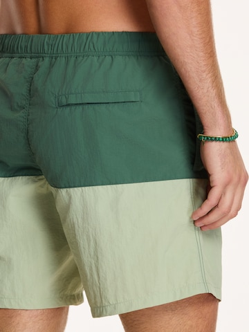 Shiwi Kratke kopalne hlače ' NICK' | zelena barva