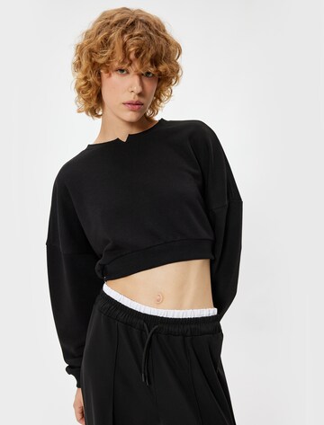 Koton Sweatshirt in Zwart: voorkant