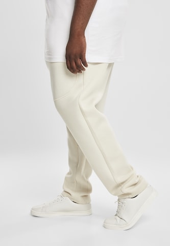 Urban Classics Normalny krój Spodnie 'Cut and Sew' w kolorze beżowy