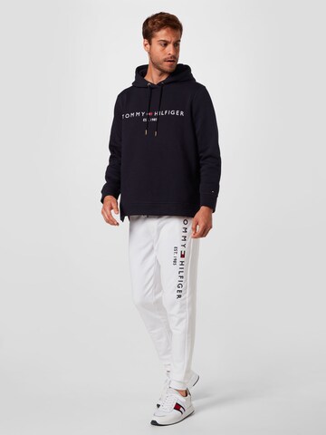 balta TOMMY HILFIGER Siaurėjantis Kelnės
