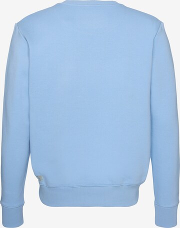 Pull-over 'Cuddle' smiler. en bleu