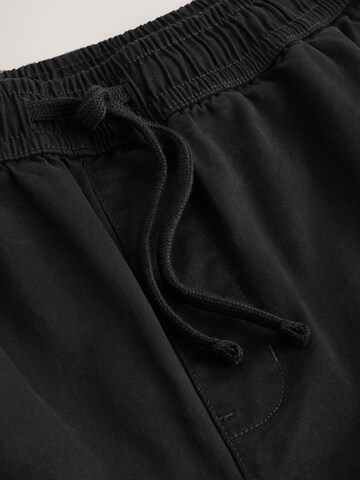 Loosefit Pantalon Next en noir