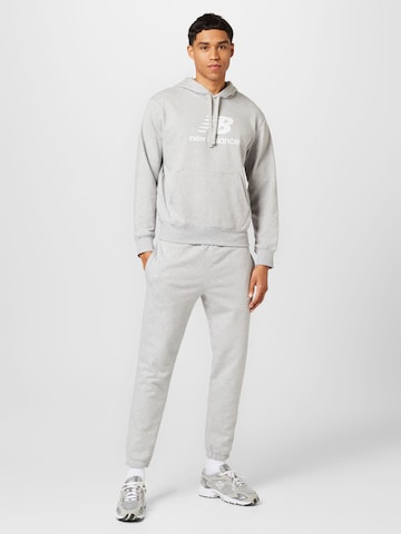 Effilé Pantalon 'Essentials' new balance en gris