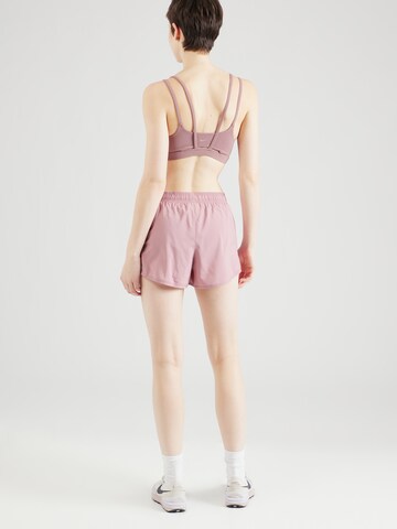 new balance Normalny krój Spodnie sportowe 'Essentials' w kolorze różowy