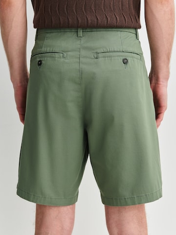 Loosefit Pantalon chino Next en vert