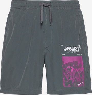 NIKE Regular Workout Pants in Grey: front