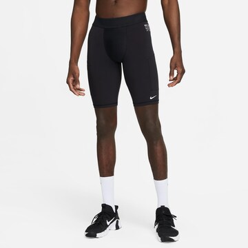 NIKE Skinny Sports trousers 'A.P.S.' in Black: front