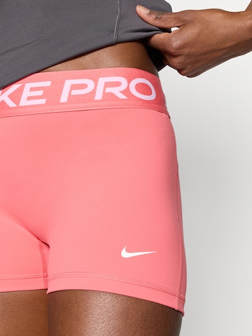 NIKE Skinny Sportshorts 'Pro 365' in Orange