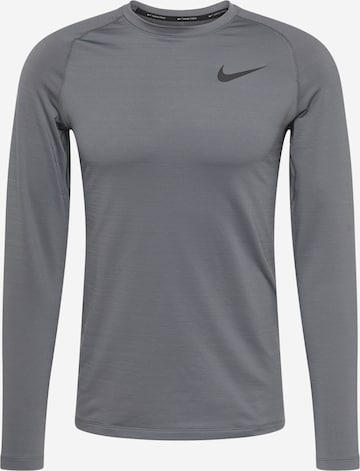 NIKE - Camisa funcionais 'Pro' em cinzento: frente