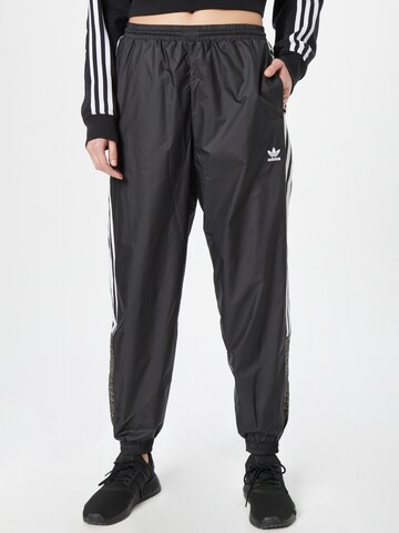 ADIDAS ORIGINALS Tapered Trousers in Black: front