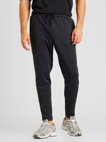 Regular Pantaloni sport de la new balance pe negru: față