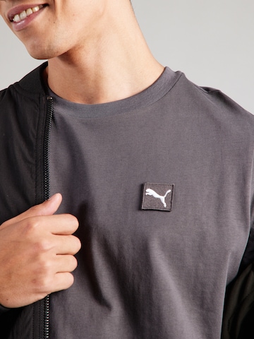 PUMA Paita 'Essentials Elevated' värissä harmaa
