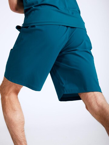 Regular Pantalon de sport 'Shorts' SPORTKIND en vert