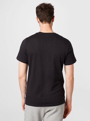 T-Shirt fonctionnel Reebok en noir