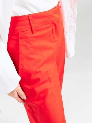 Regular Pantalon à plis TOMMY HILFIGER en rouge