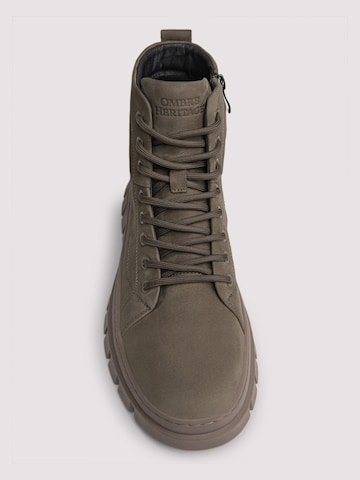 Ombre - Botas con cordones en verde