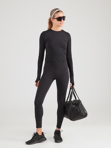 Fabletics Toiminnallinen paita 'FEATHER TECH+' värissä musta