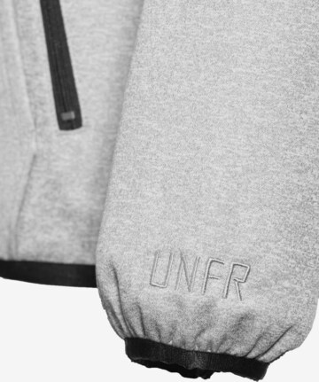 Unfair Athletics Übergangsjacke in Grau