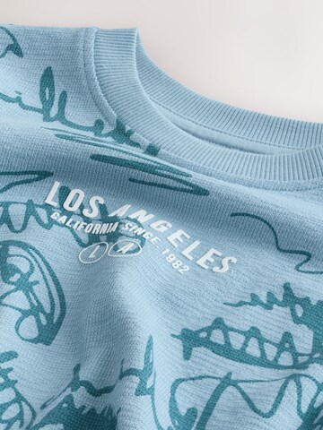 Next - Camiseta en azul